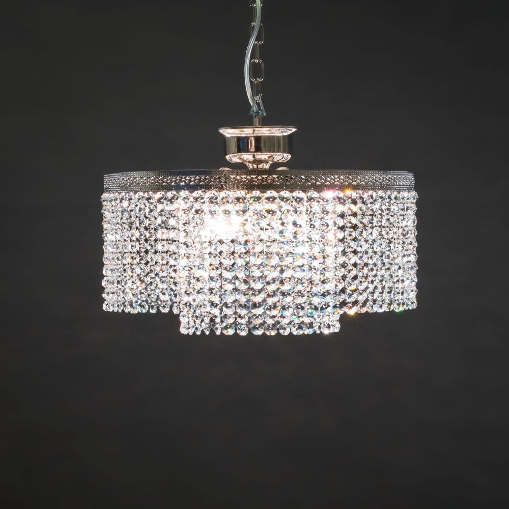 A chandelier full of crystal sparkle. Round PL is a modern crystal lamp that brings spectacular brilliance to its surroundings.